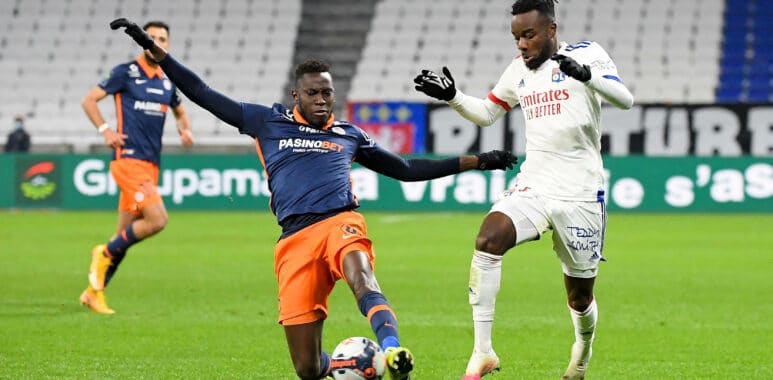 06 Junior SAMBIA (mhsc) - 27 Maxwel CORNET (ol) FOOTBALL : Lyon vs Montpellier - Ligue 1 Uber Eats - 13/02/2021 FEP/Pano | AllezPaillade.com