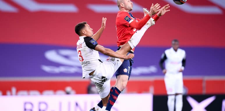 03 DANIEL CONGRE (MHSC) - 17 BURAK YILMAZ (LIL) FOOTBALL : Lille vs Montpellier - Ligue 1 Uber Eats - 16/04/2021 FEP/Pan | AllezPaillade.com