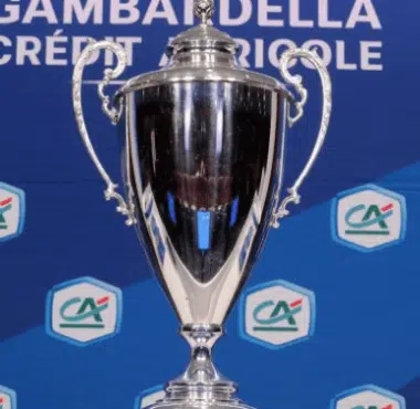 Shiny silver trophy on a blue backdrop adorned with Cr&eacute;dit Agricole logos