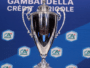 Shiny silver trophy on a blue backdrop adorned with Cr&eacute;dit Agricole logos