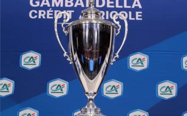 Shiny silver trophy on a blue backdrop adorned with Cr&eacute;dit Agricole logos