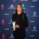 Young woman in a black blazer holding an award on a blue sponsor backdrop (logos include Canal+, Arkema, and Troph&eacute;es).