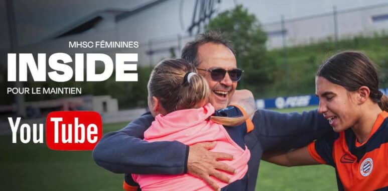 E433CF99-D51C-4C21-BB67-7CE5C1CE70EB | AllezPaillade.com A man hugging a young girl and a female footballer on a grassy field, with YouTube and 'INSIDE' branding in white text above, suggesting a video feature.