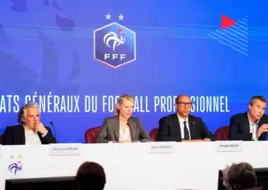Four panelists sit at a press conference table against a blue backdrop with the FFF logo.