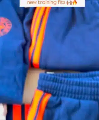 Instagram story announcing Montpellier Football Club new training fits, shown on a person wearing a blue training suit with orange stripes.