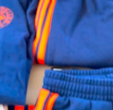 Instagram story announcing Montpellier Football Club new training fits, shown on a person wearing a blue training suit with orange stripes.