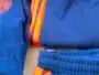Instagram story announcing Montpellier Football Club new training fits, shown on a person wearing a blue training suit with orange stripes.