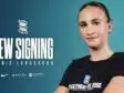 New signing announcement: Marie Levasseur against a teal backdrop with sponsor logos and text 'Together We Rise' on her shirt.