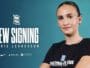 New signing announcement: Marie Levasseur against a teal backdrop with sponsor logos and text 'Together We Rise' on her shirt.