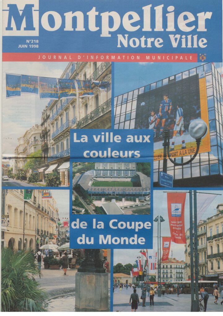 PER1PER3_MNVFRAC34172_1PER3_218-01 | AllezPaillade.com Collage-style Montpellier street scene with blue banners and a large sign reading 'La ville aux couleurs' as pedestrians walk along a plaza.