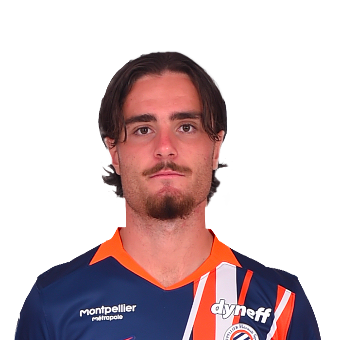 Portrait of a man in a dark blue football jersey with orange accents, facing the camera, team logos visible on the chest.