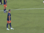 Soccer players in blue and orange uniforms stand near the center line; ball sits on the field as a 0-0 scoreboard and timer appear on screen (00:22) with a beIN SPORTS logo.