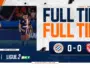 Ligue 2 match banner with two players in blue and orange, and bold 'FULL TIME' text; score is 0-0.