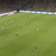 Football match scene with green team defending near their goal as ASSE leads MHSC 1&ndash;0 at 45:00 on screen.