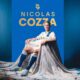 Poster featuring Nicolas Cozza in a white soccer kit on a blue background, with his name in gold lettering above him