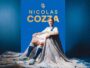 Poster featuring Nicolas Cozza in a white soccer kit on a blue background, with his name in gold lettering above him